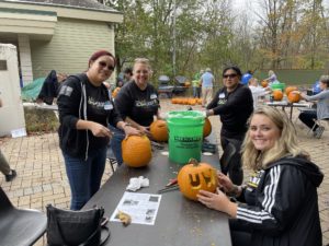 Pumpkin carving is a fun day of service for your group.